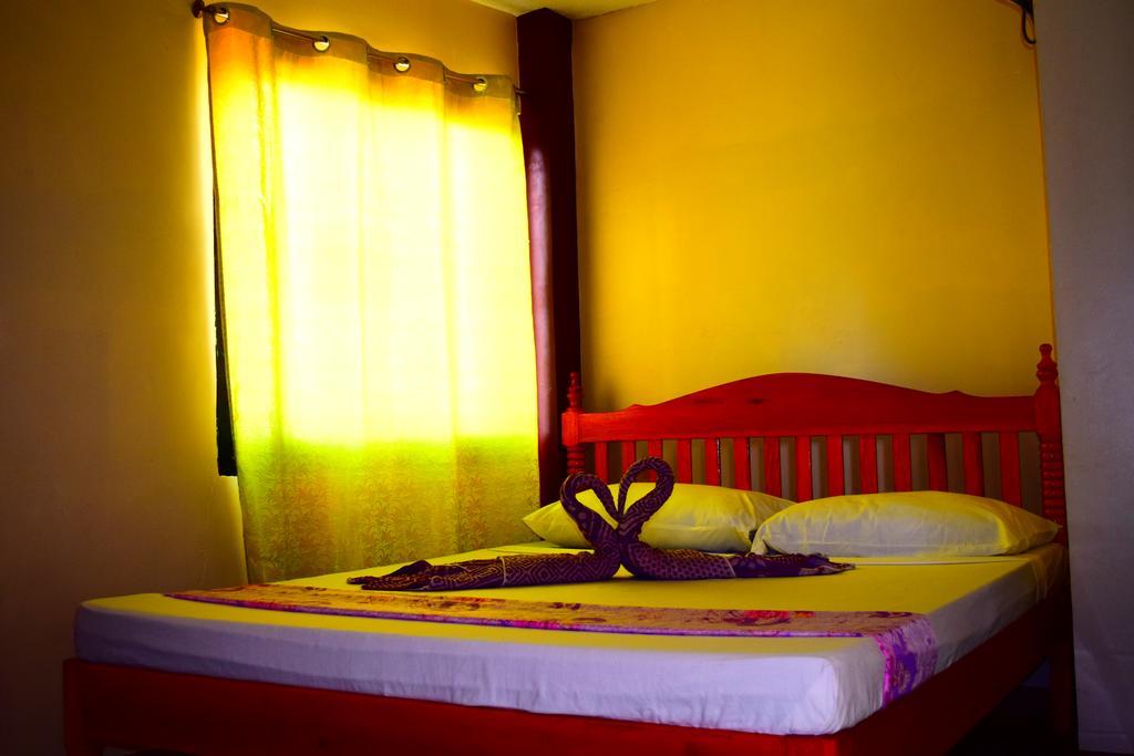 El Gallo Traveler'S Pension Puerto Princesa Esterno foto